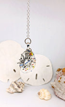 Load image into Gallery viewer, Red, Yellow, Blue Confetti Fused Glass Necklace with Sun Charm
